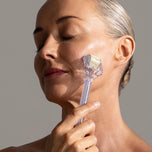 Model using Home Roller on her face