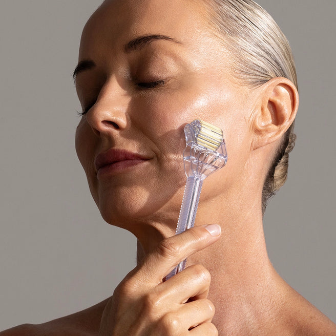 Model using Home Roller on her face