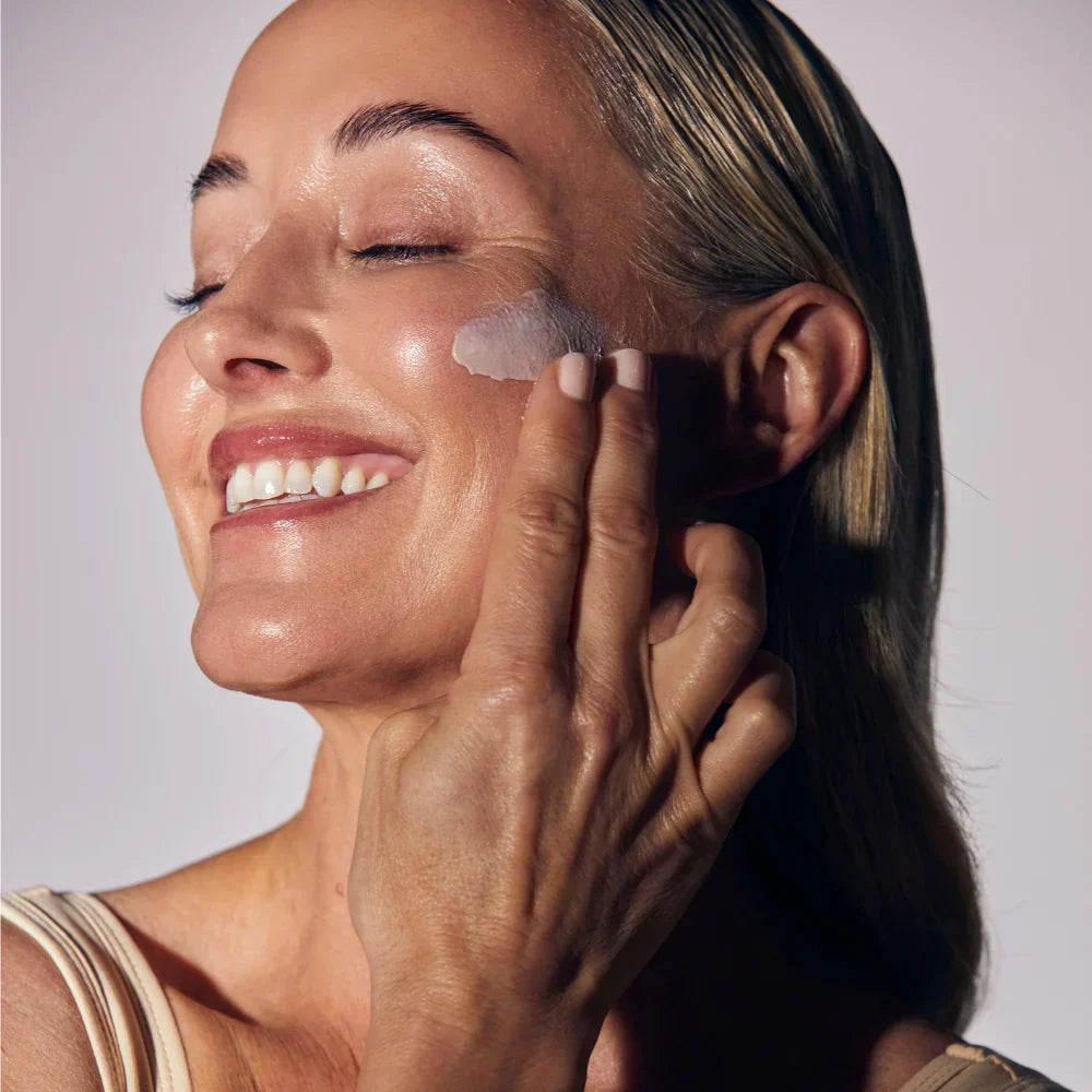 Skincare model applying skincare