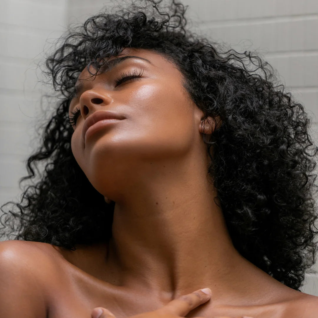 Middle aged woman and young woman sitting next to each other