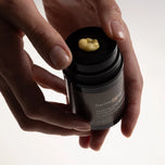 Model pumping DermaCalm from the bottle