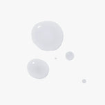 Dermiotic elixir fortified with prebiotics and probiotics to balance the surface microbiome of the skin. Skincare texture