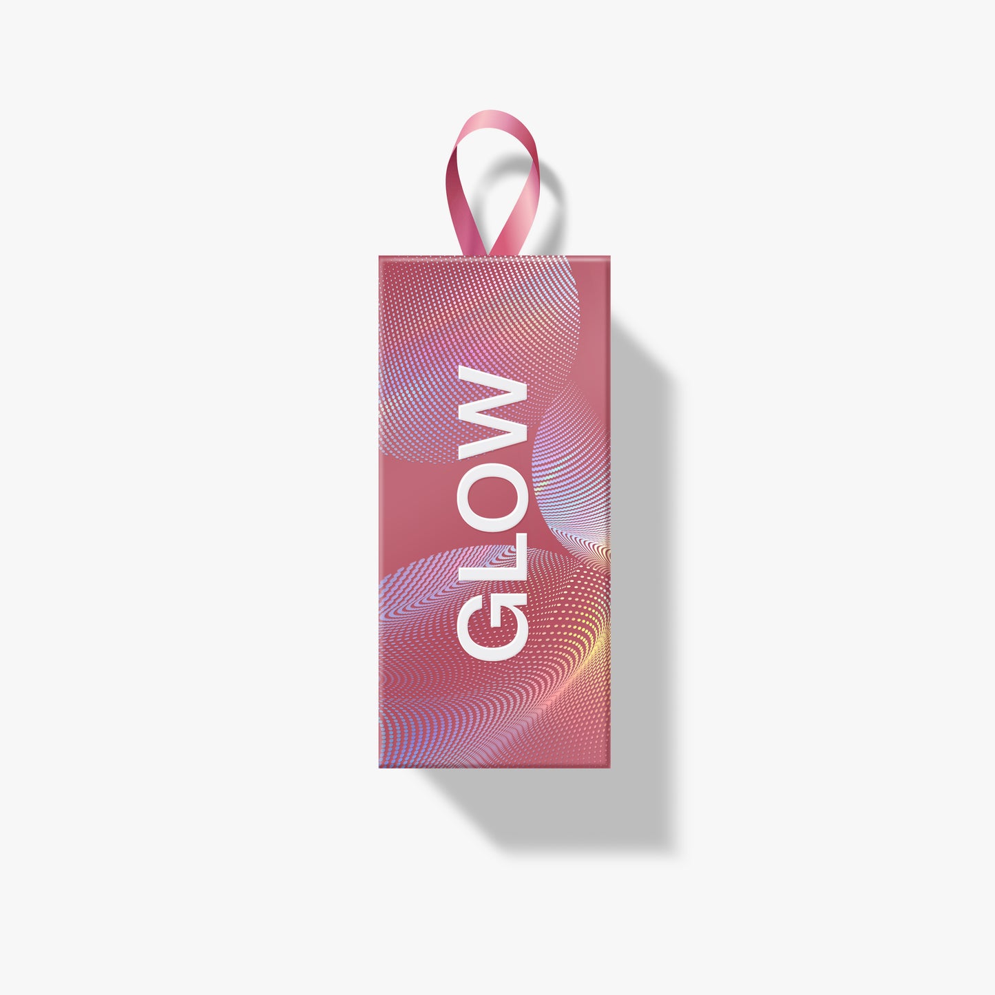 A rectangular pink product box with a hanging loop at the top, featuring the word 'GLOW' in large white vertical text over an abstract wavy line pattern. The box is centered on a light gray background with a soft shadow to the right.