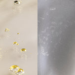 Close-up of a translucent frosted surface with a split view: left side shows small clear droplets with yellow-gold highlights on a pale warm background, right side shows the frosted texture in soft gray light.