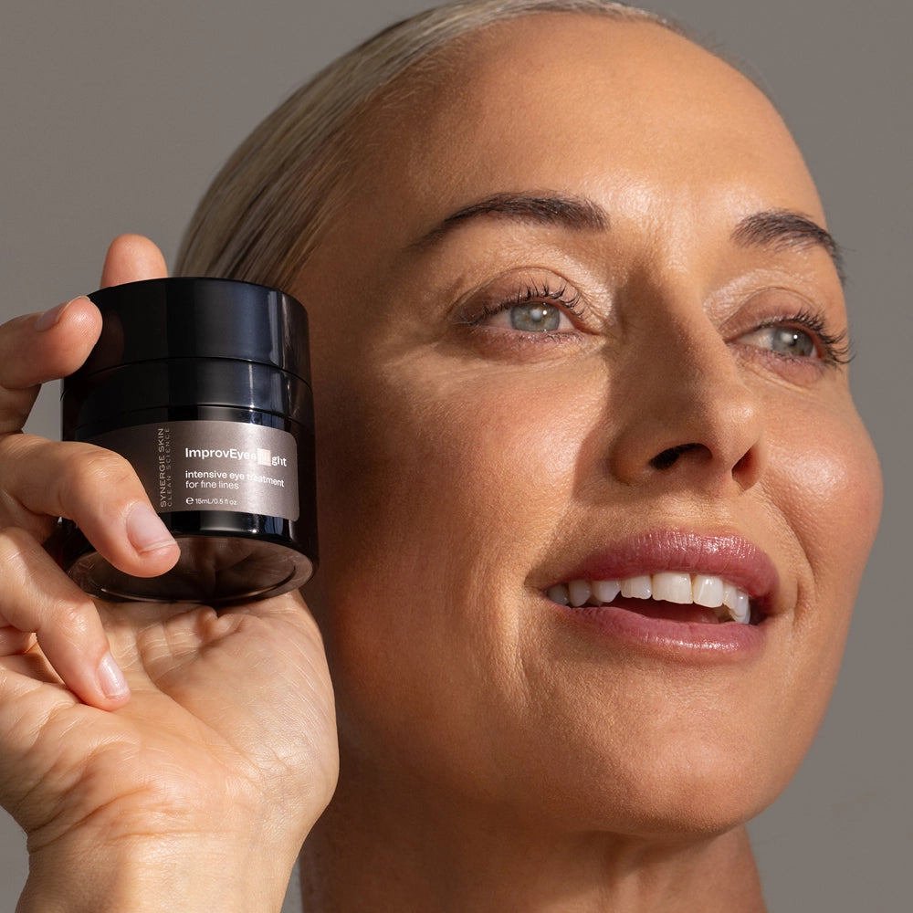 Model holding ImprovEyes Night bottle next to their face