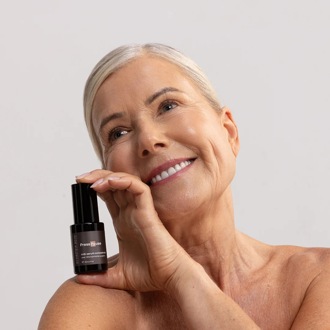 Skincare model holding PressPause