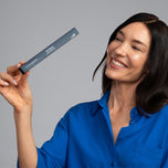 Model holding SynSipper 