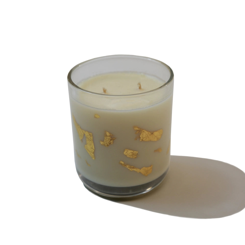Close up image showing the Radiance Ritual Candle and its gold leaf detailing